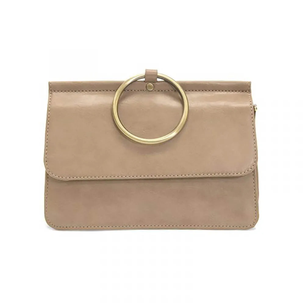 Beige handbag with a gold ring handle on a white background
