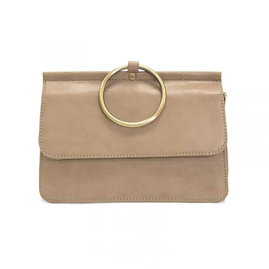 Beige handbag with a gold ring handle on a white background