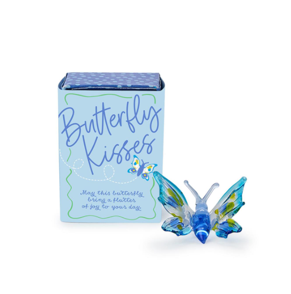 Butterfly figurine with 'Butterfly Kisses' packaging on a white background