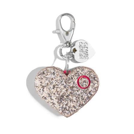 Heart-shaped glittery safety alarm keychain with a red accent on a white background