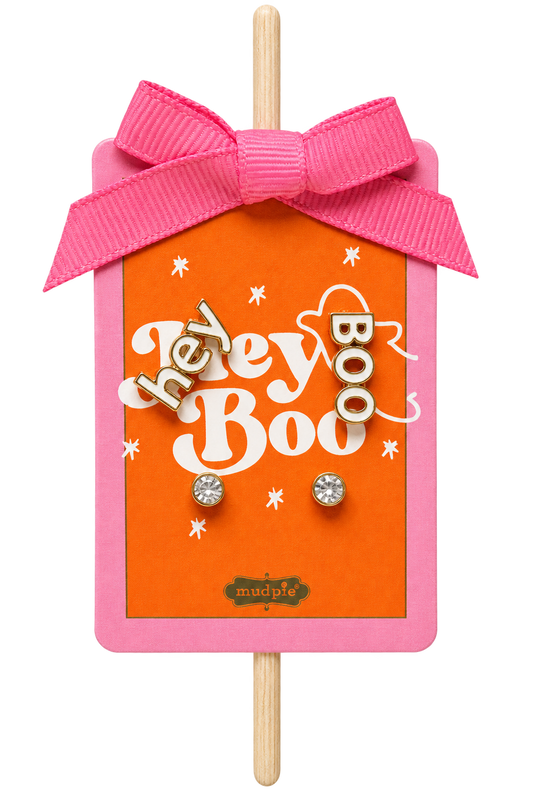 A Halloween-themed earring display card shaped like a pink lollipop with an orange center, pink ribbon bow, and wooden stick. The card reads 'hey Boo Boo' in white script with small white stars and features two clear rhinestone stud earrings attached.