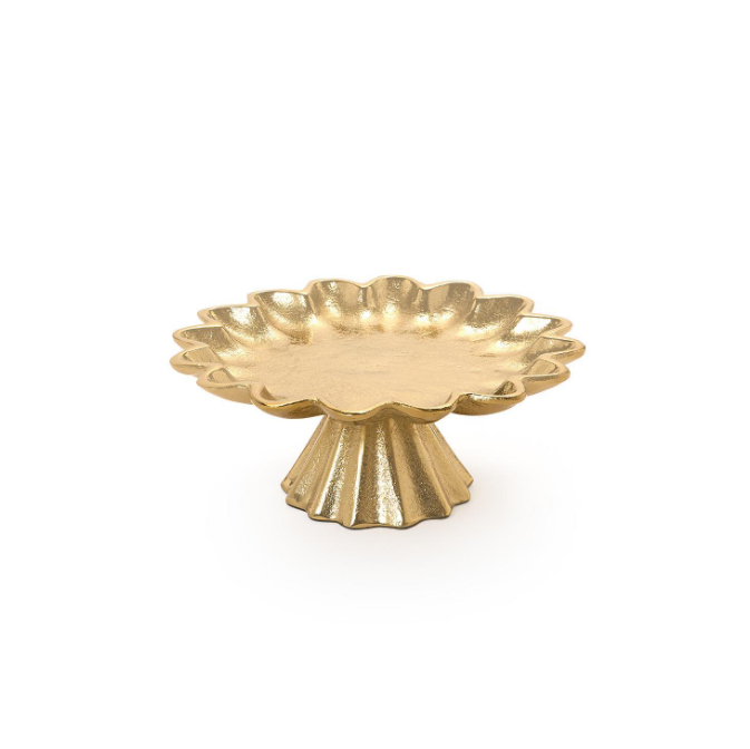A gold-colored pedestal stand with a scalloped, flower-like rim and a fluted base, shown on a plain white background.