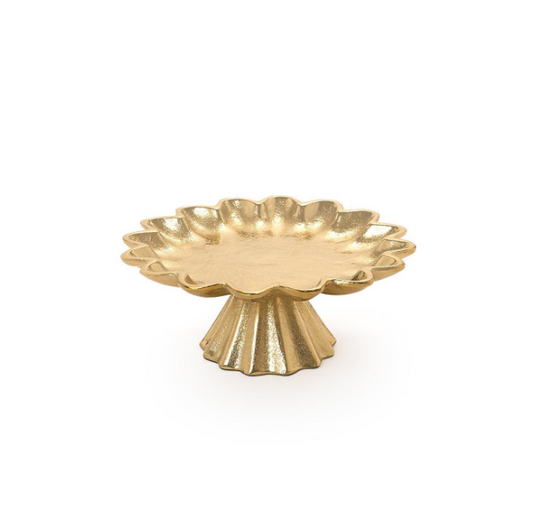 A gold-colored pedestal stand with a scalloped, flower-like rim and a fluted base, shown on a plain white background.