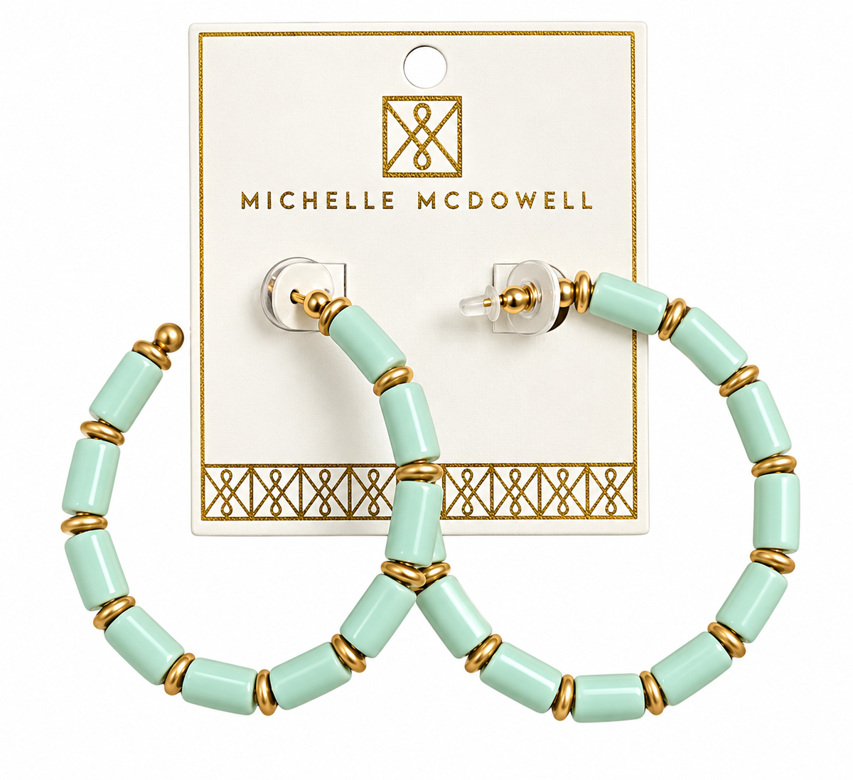 Mint green beaded hoop earrings with gold spacer rings, displayed on a white Michelle McDowell brand card against a white background.