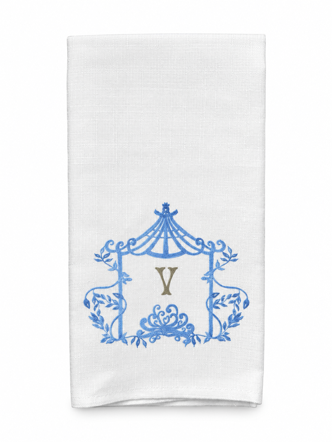 A white kitchen towel featuring a blue ornate crest design with a central gold monogram letter 'Y', shown against a plain white background.