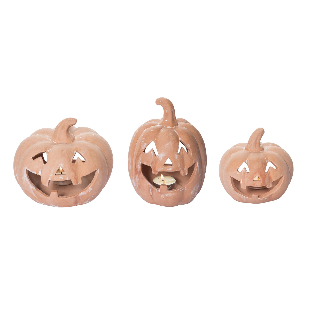 Three ceramic jack-o'-lantern candle holders on a white background