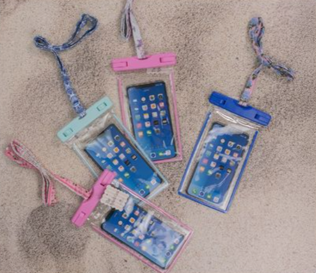 Clear phone pouches with blue designs on a sandy surface water splash case phone protector